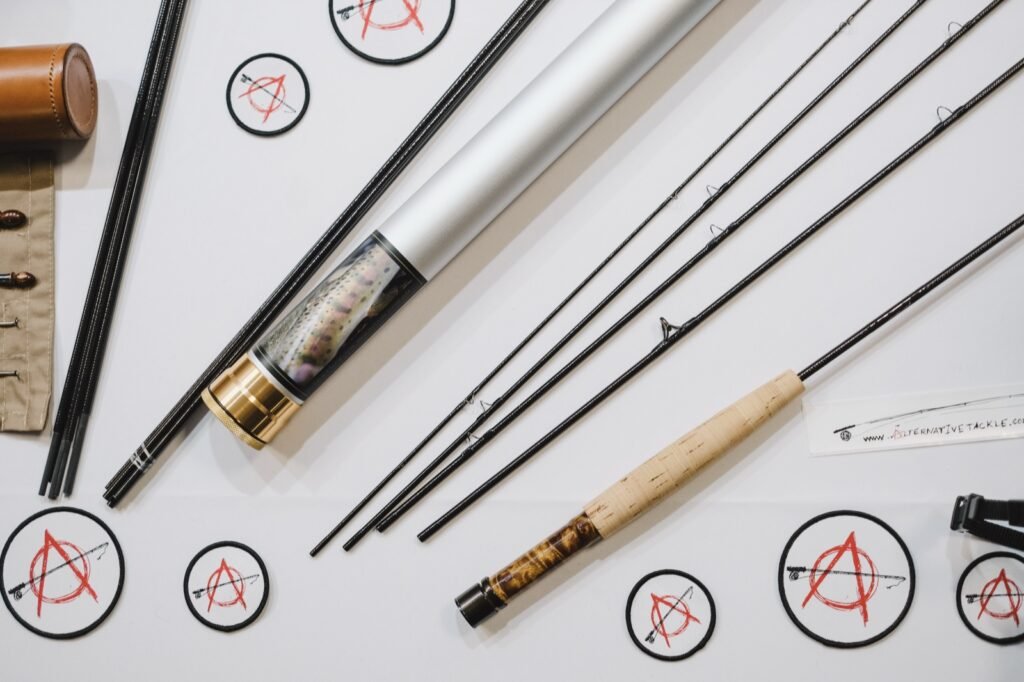 Fly rods and patches laid out on a white table